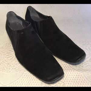 Stuart Weitzman black suede slip ons